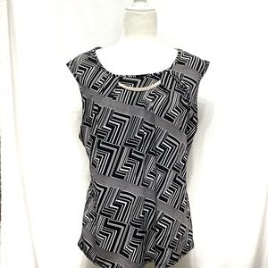 Notations sleeveless black and white blouse